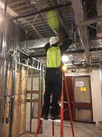 Man Installing Ducts 